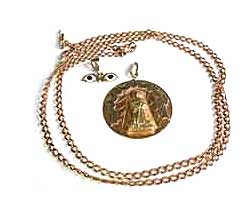 Gold St. Francis pendant
